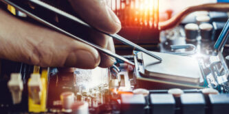 Engineer fixing computer